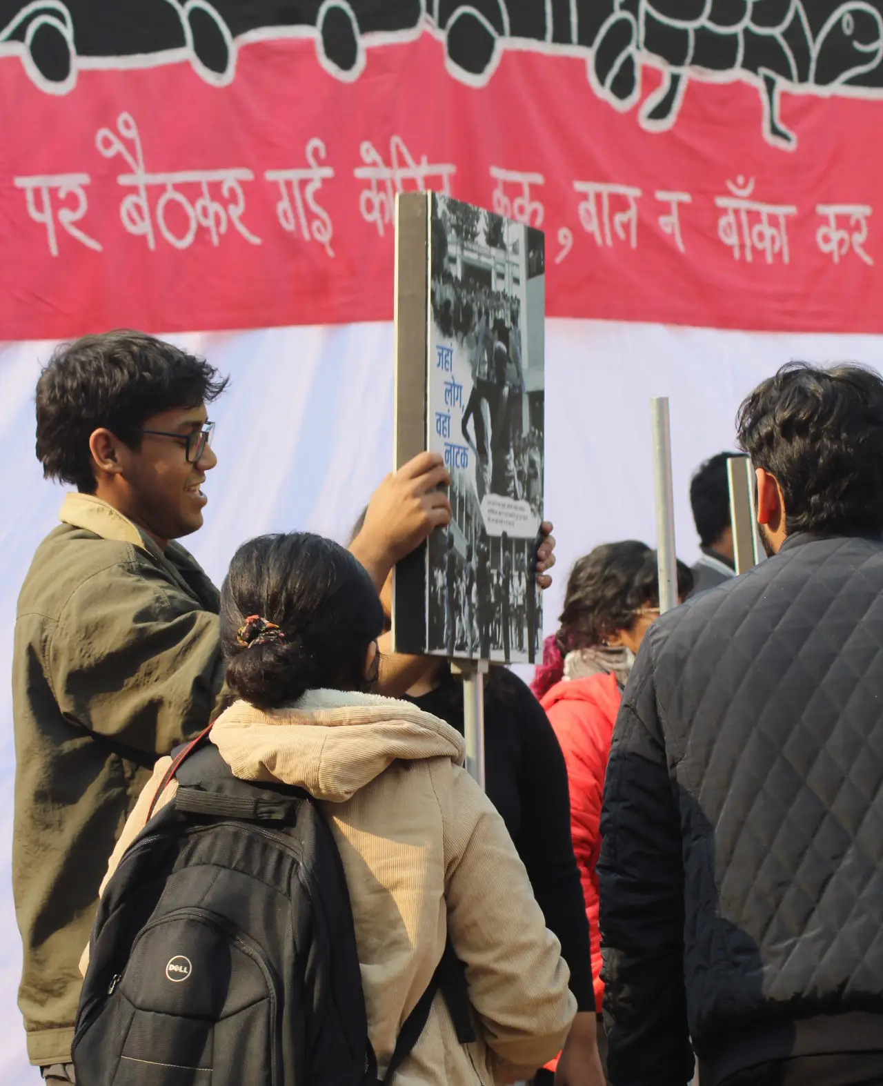 IIAD Students Holding Poster