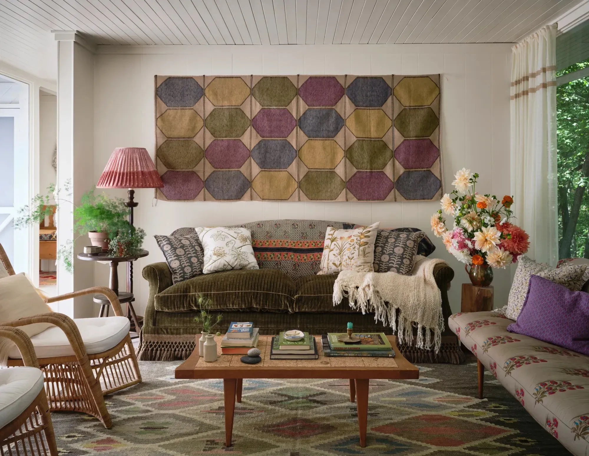 Eclectic living room with geometric wall art
