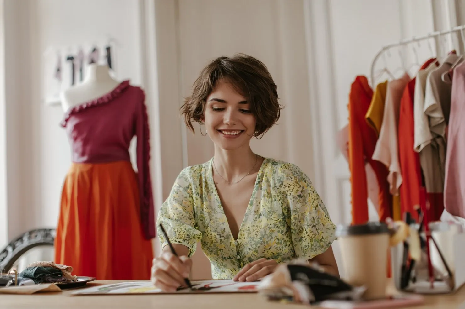 Female designer creating a fashion sketch