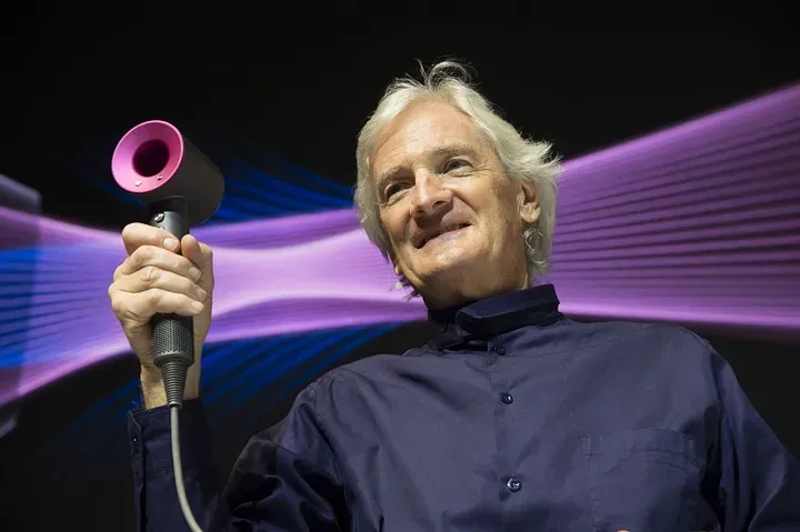 Celebrated designer James Dyson with Dyson product