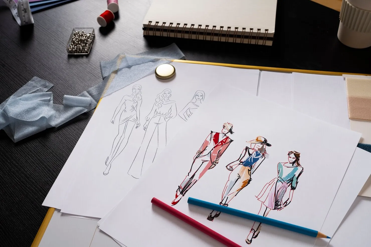  Fashion sketches with fabric swatches