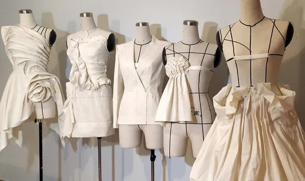 Dress forms showcasing garment draping