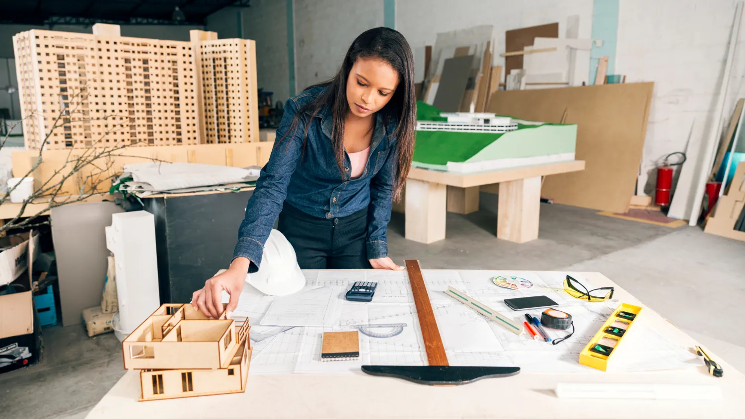 Interior designer working on floor plan