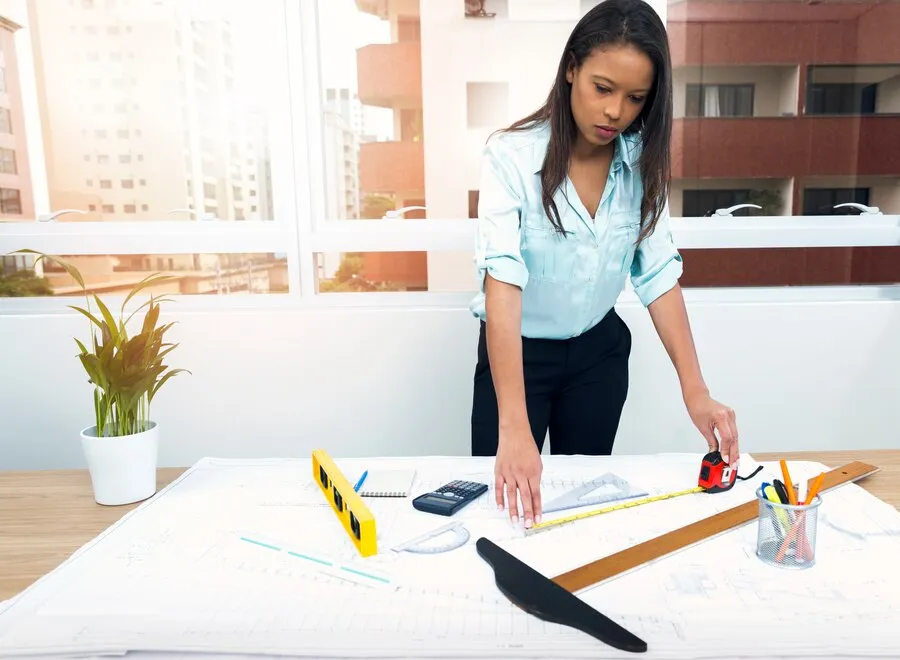 Woman measuring dimensions for interior project